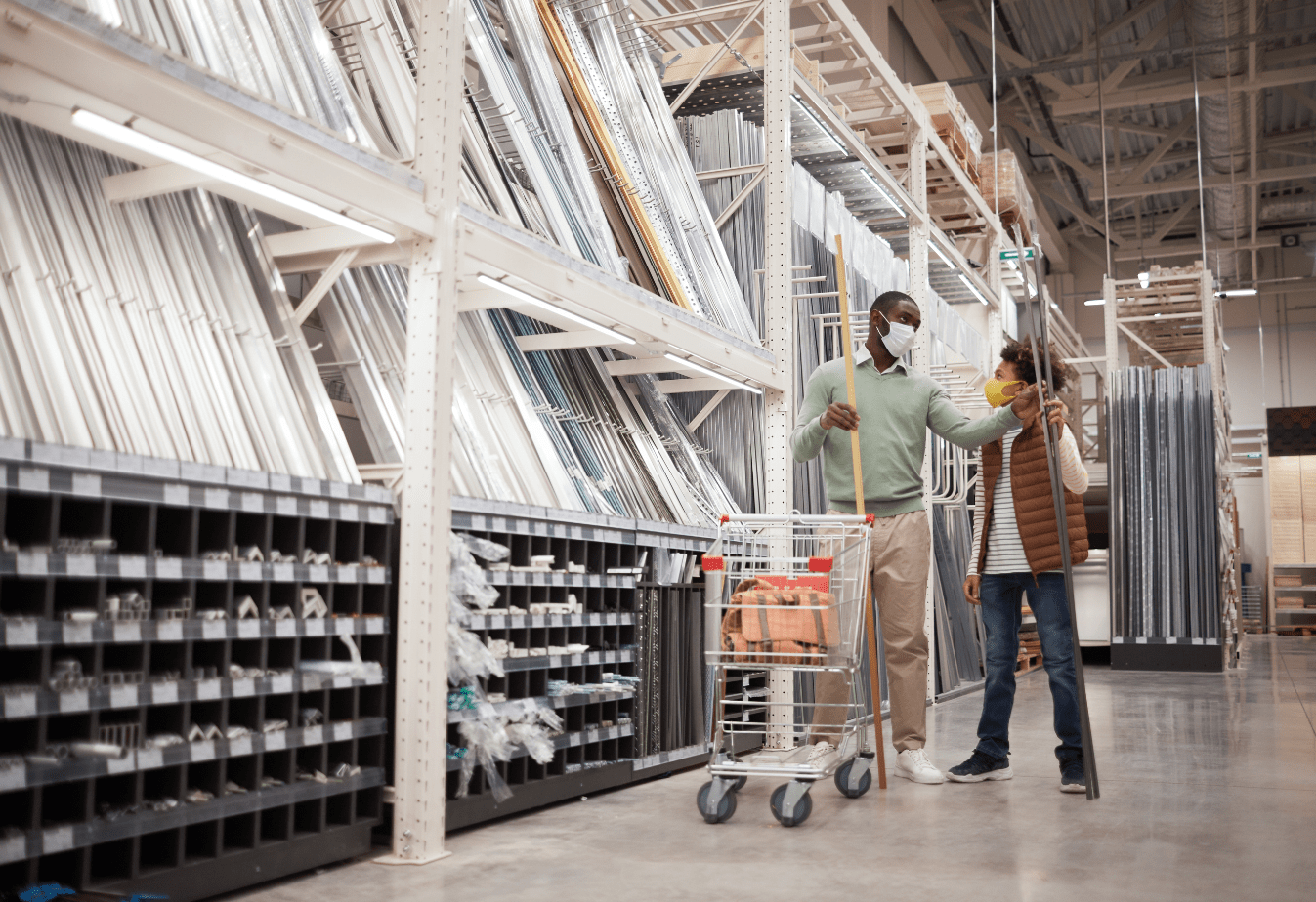 a man and his son in a home improvement store examining products