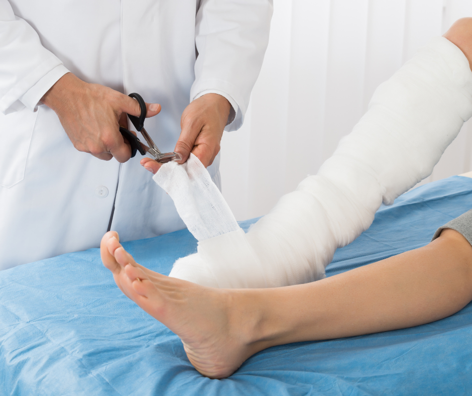 a doctor bandaging a person's foot