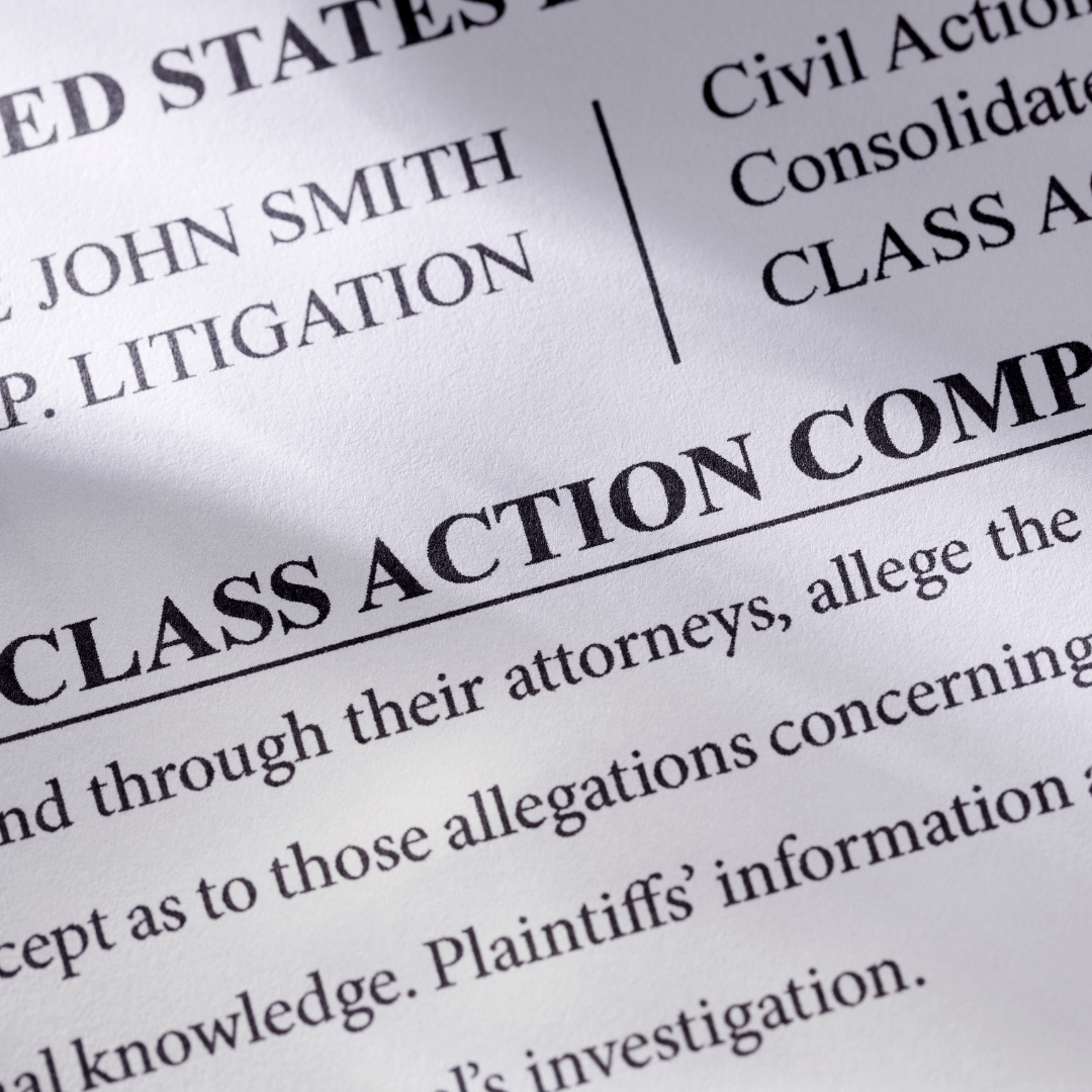 picture of text reading "class action" followed by details of a made up suit for the purpose of having a stock photo
