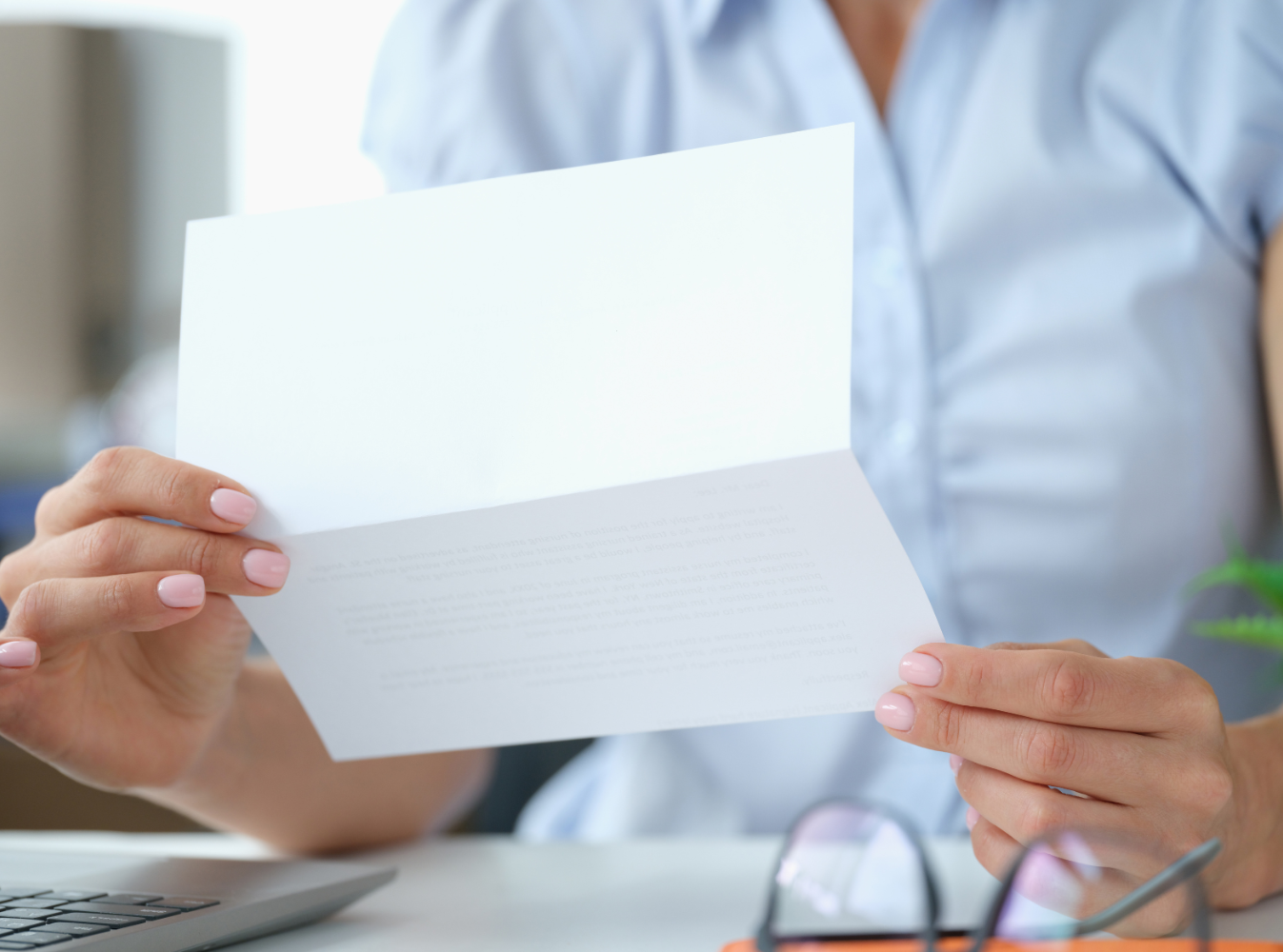person reading a letter
